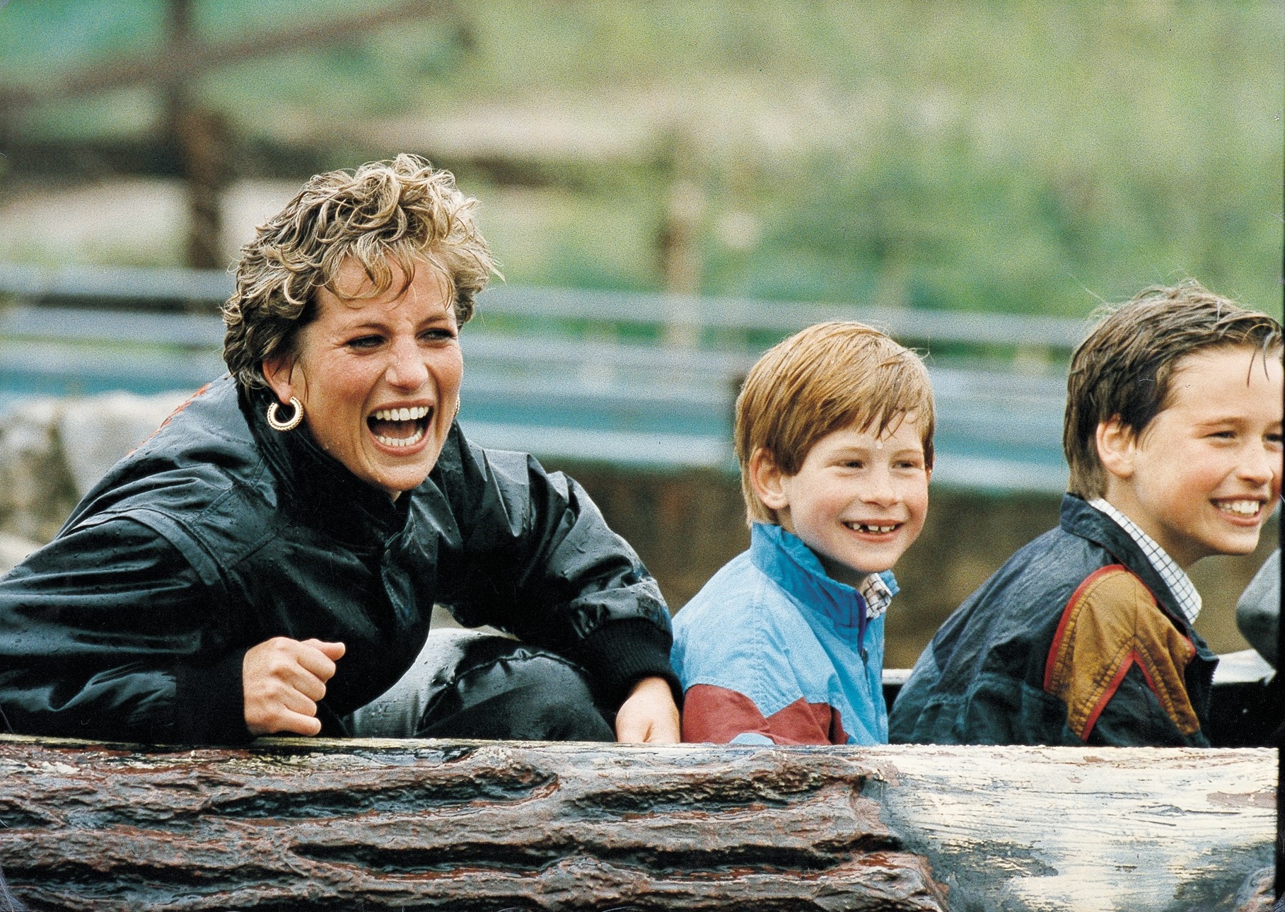 Apr 13, 1993 - London, London, United Kingdom - Diana, PRINCESS OF WALES (died 31/8/1997), with PRINCES WILLIAM and PRINCE HARRY on the Loggers Leap ride at Thorpe Park. A delighted Princess Diana and her sons launched themselves with laughter into the thrills, spills and spray of their favourite theme park yesterday. Getting soaked to the skin-and almost frightened out of it-was all part  of the fun as they went up, down and flying around on the high-tech rides. It was the third Easter holiday outing to Thorpe Park in Surrey for Diana, William and Harry. The Princess in black leather jacket, black jeans and suede ankle boots, paid for two Ł35 family Supersave tickets for her five-strong party. (, Image: 87515211, License: Rights-managed, Restrictions: , Model Release: no, Credit line: Mike Forster / Solo / Profimedia